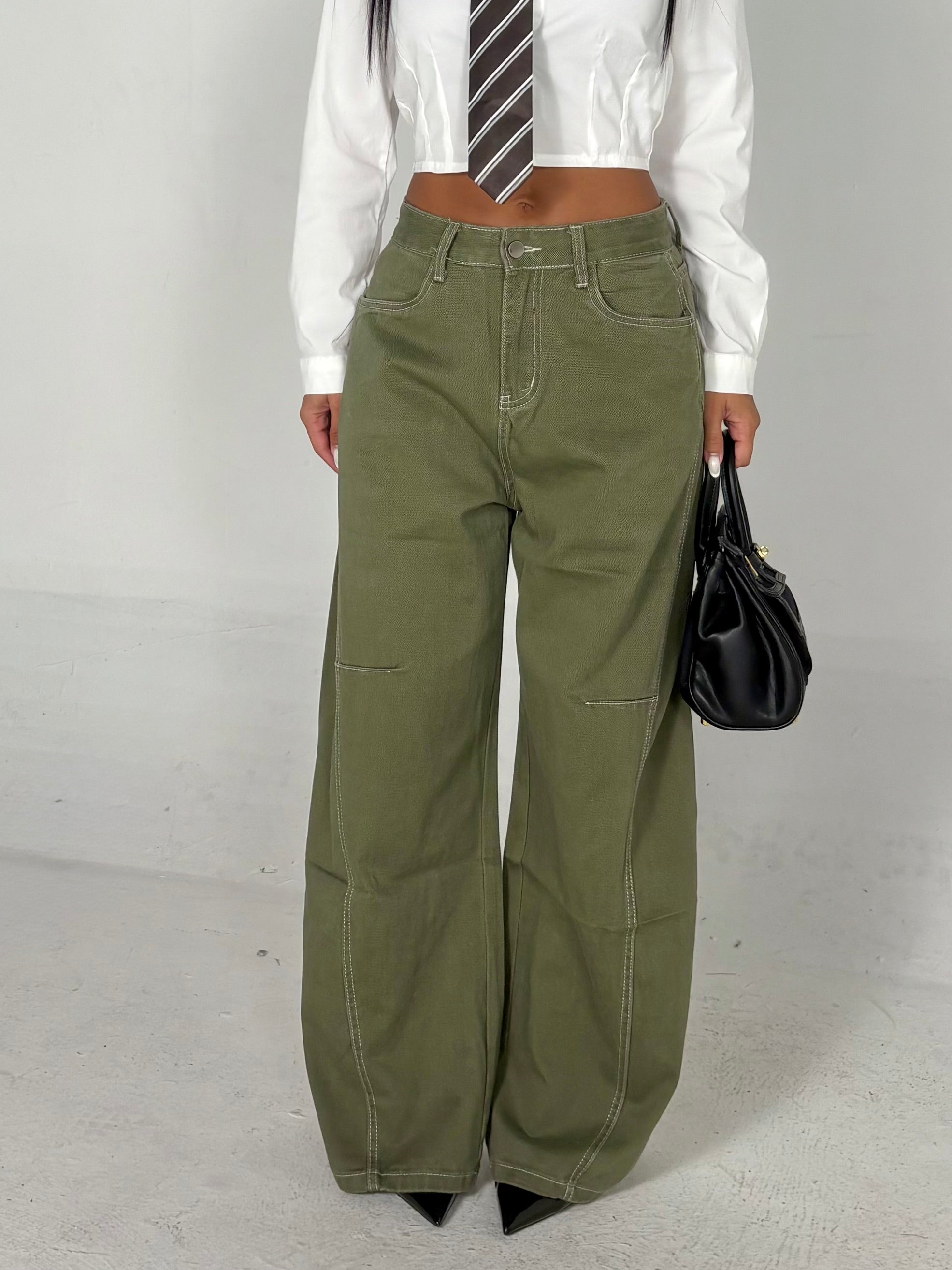 Jeans con cuciture bianche verde