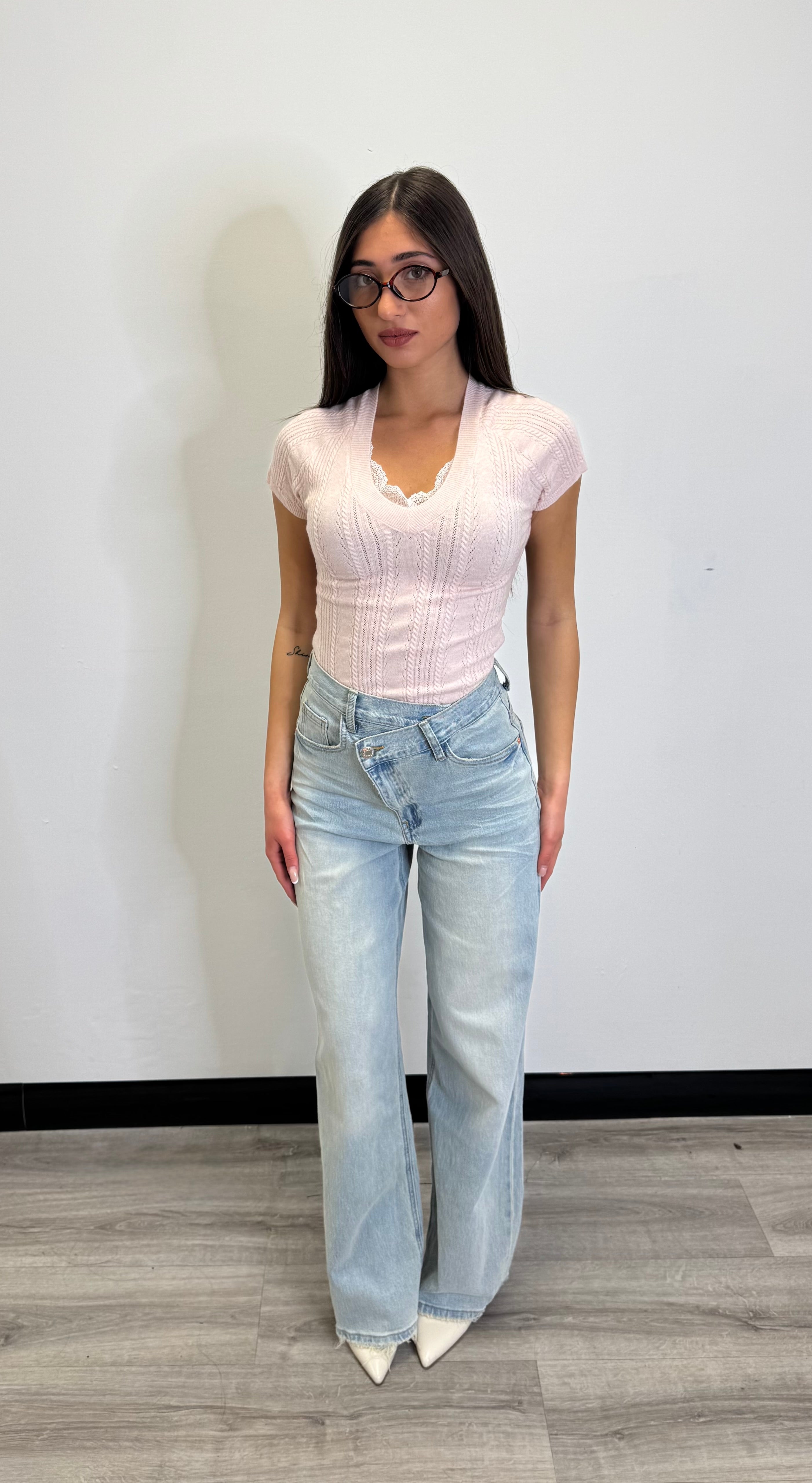 Jeans taglio asimmetrico