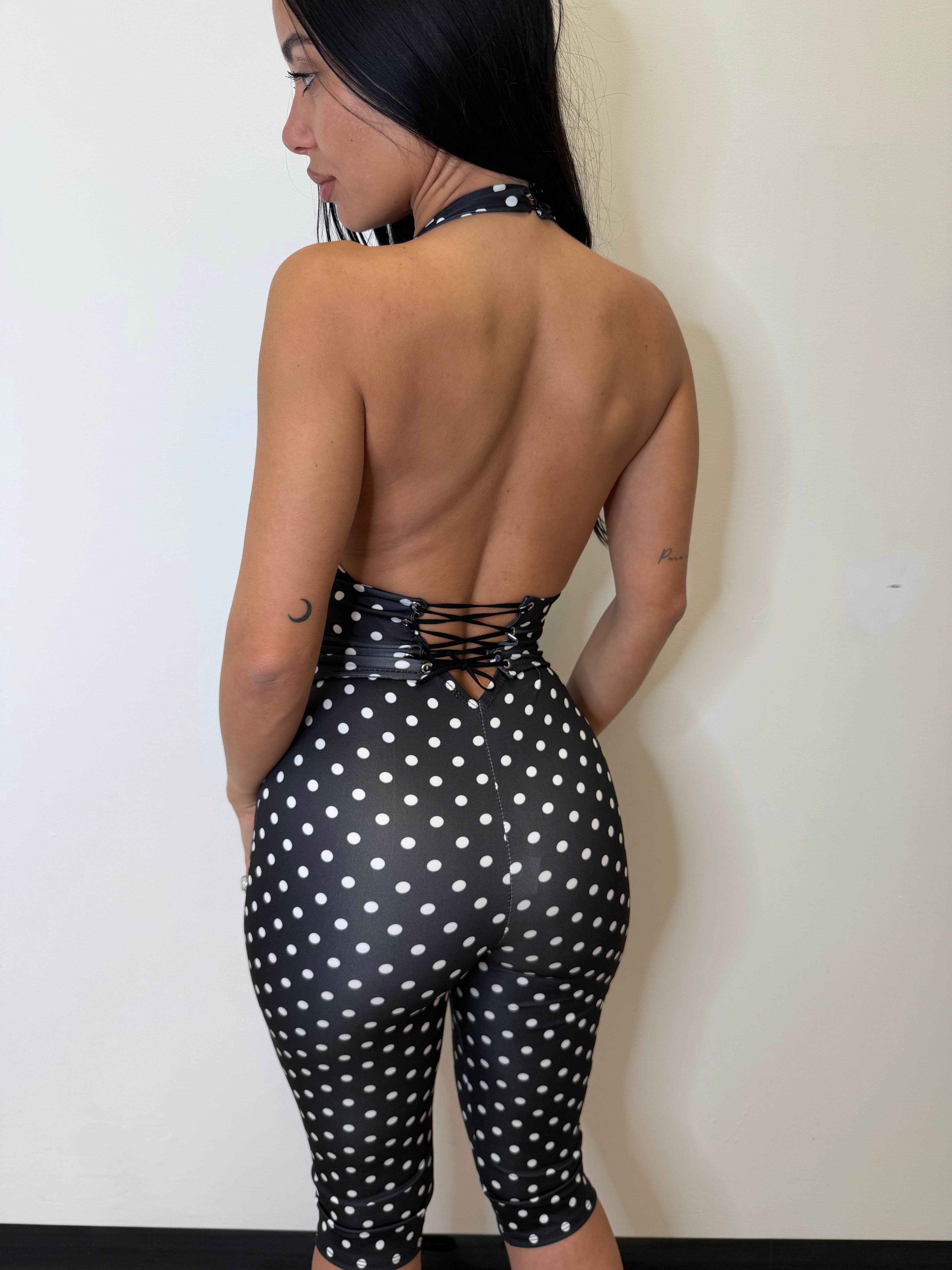 Tuta con corsetto a pois