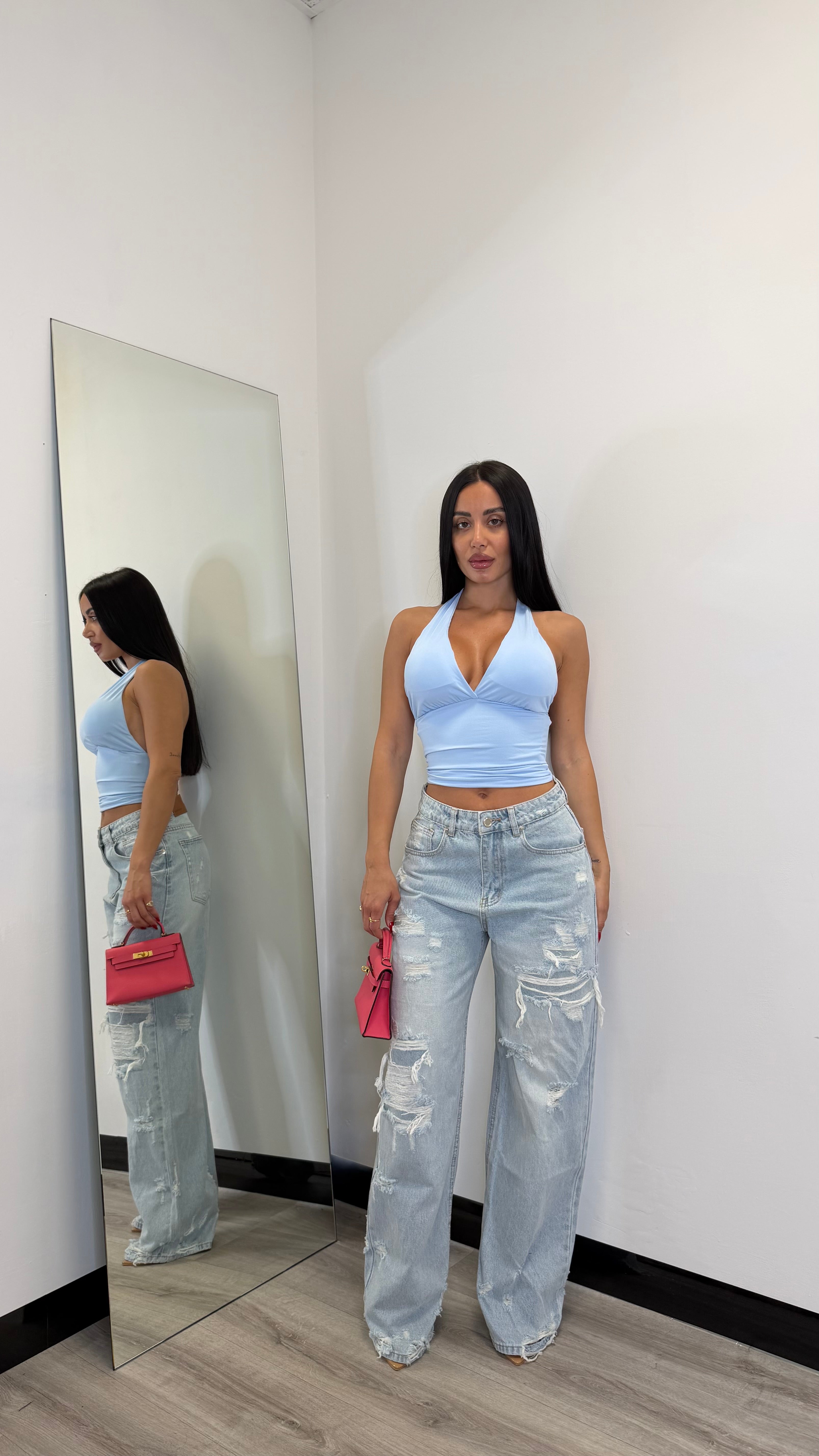 Jeans con strappi lavaggio chiaro