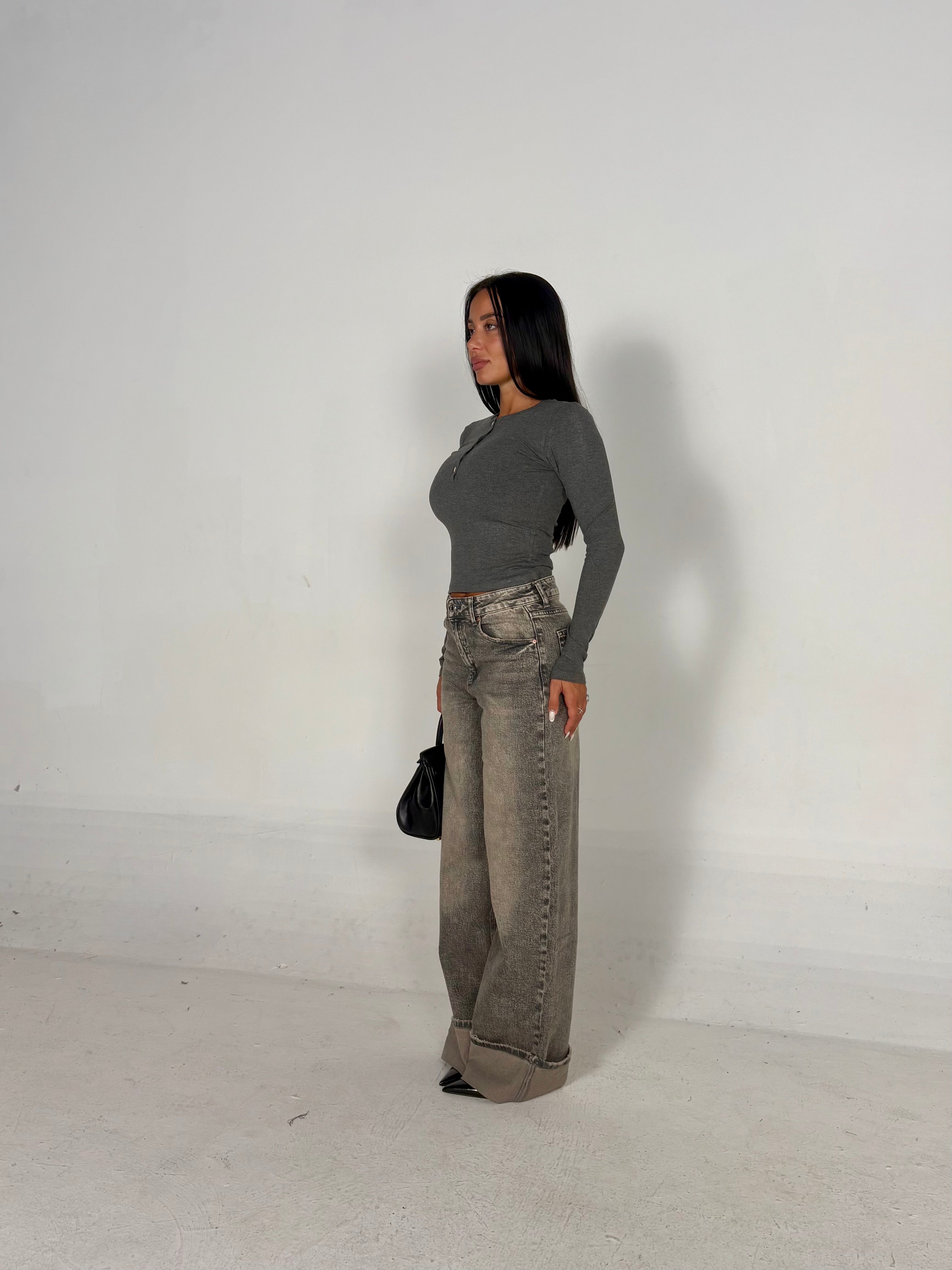Jeans con piegone nero